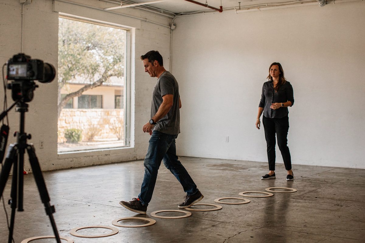 A client walking through a movement assessment at Totex Movement Studio